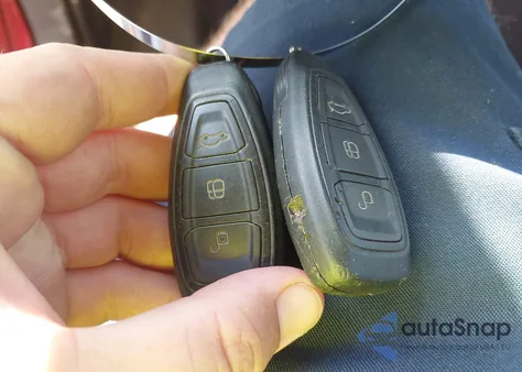 2012 Ford Focus Titanium z USA, uszkodzony, nr VIN 1FAHP3J21CL258049